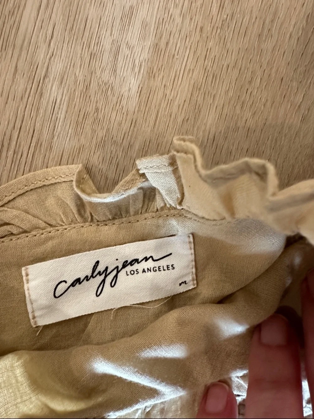 Carly Jean Los Angeles Cream Tiered Smocked Flutter Dress - Picture 2 of 4